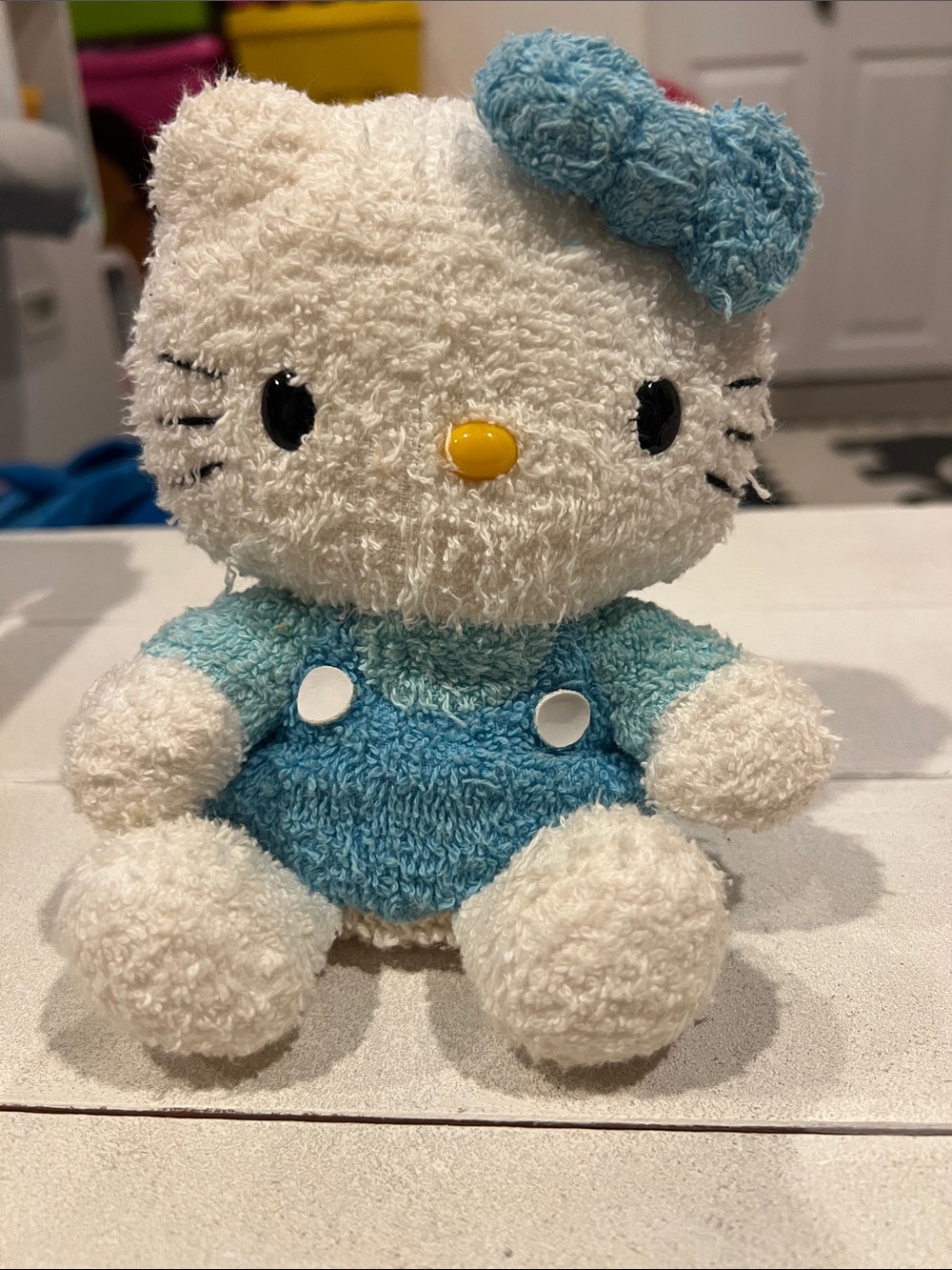 Vintage fuzzy blue-and-white Hello Kitty plush